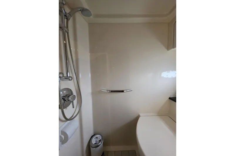  Yacht Photos Pics Shower area in 2010 Sea Ray 470 Sundancer yacht, featuring modern fixtures and sleek design.