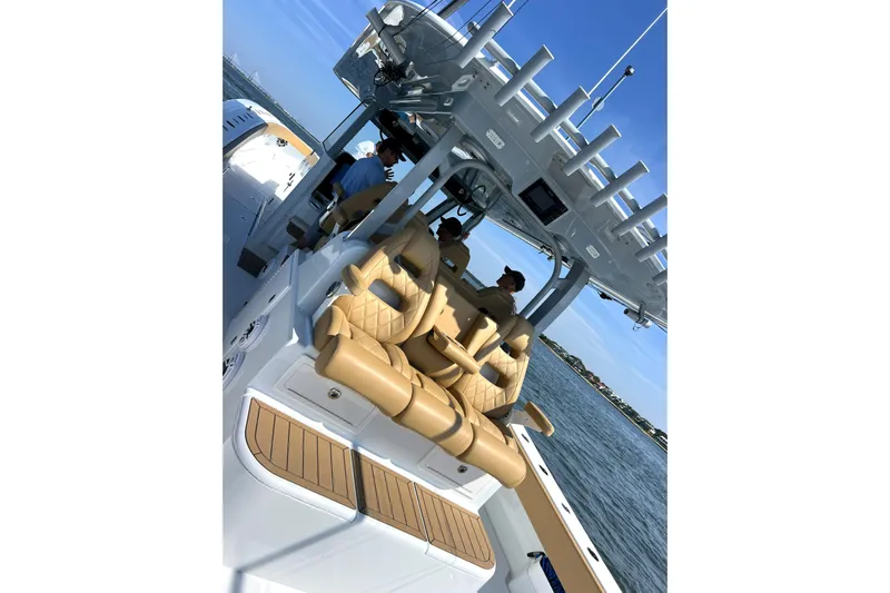 Lafe Yacht Photos Pics 2026 Freeman 47 boat interior with tan seats and ocean view.