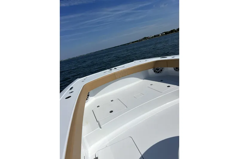 Lafe Yacht Photos Pics Freeman 47 boat, 2026 model, cruising on open water under clear skies.