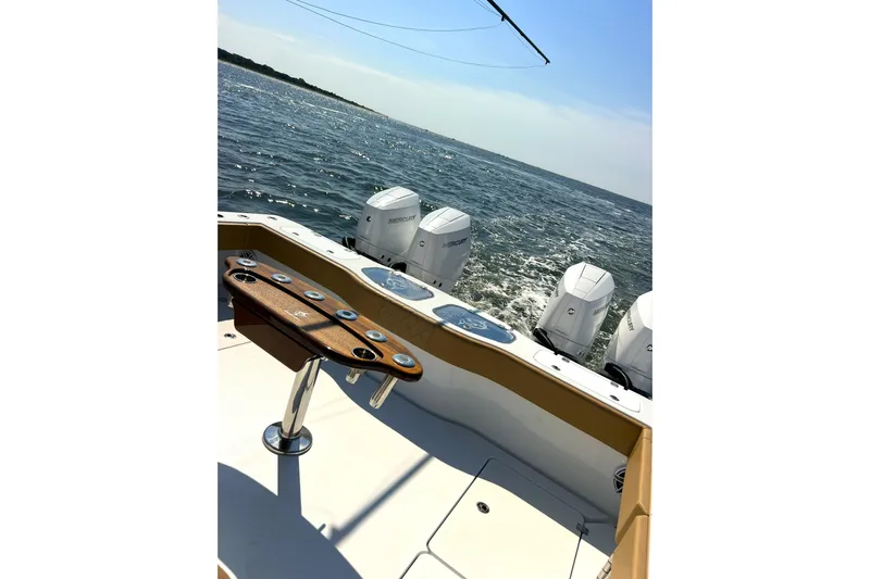 Lafe Yacht Photos Pics Freeman 47 boat, 2026 model, with multiple outboard engines on open water.