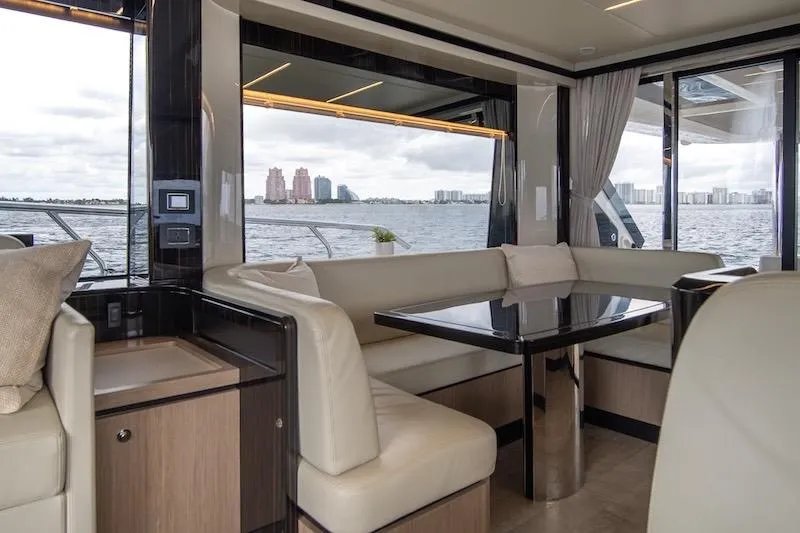  Yacht Photos Pics Luxurious interior of 2023 Absolute 62 Fly yacht with waterfront view.