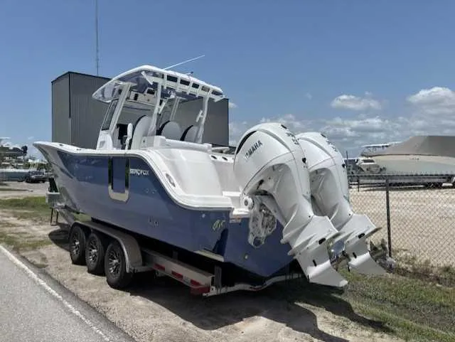 Black Label Marine Yacht Photos Pics 2025 Sea Fox 328 Commander boat on trailer with dual Yamaha engines.