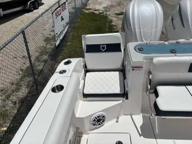 Black Label Marine Yacht Photos Pics 2025 Sea Fox 328 Commander boat interior with seating and cup holders.