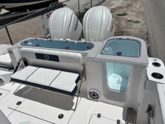 Black Label Marine Yacht Photos Pics 2025 Sea Fox 328 Commander boat with dual engines and seating area.