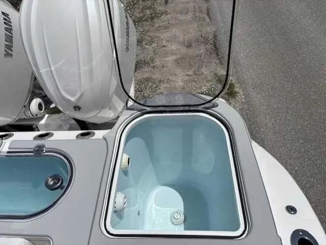 Black Label Marine Yacht Photos Pics 2025 Sea Fox 328 Commander boat with open storage compartment and Yamaha engines.