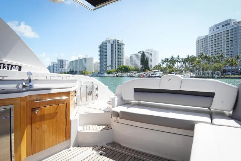  Yacht Photos Pics 2017 Four Winns H350 yacht interior with city skyline and waterfront view.