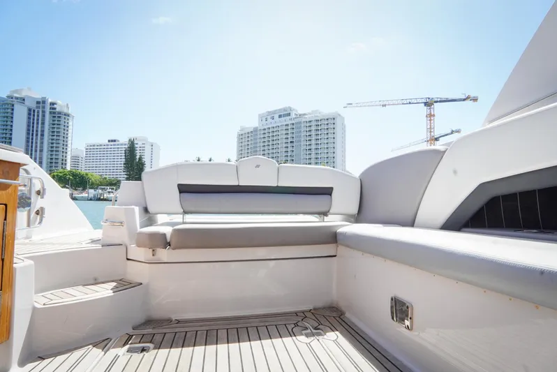  Yacht Photos Pics 2017 Four Winns H350 yacht interior with cityscape and cranes in the background.