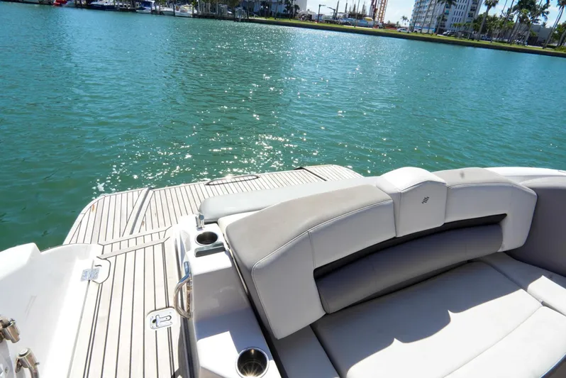  Yacht Photos Pics 2017 Four Winns H350 boat with spacious seating on calm water.