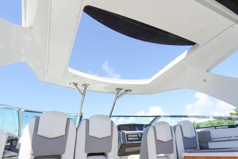  Yacht Photos Pics 2017 Four Winns H350 boat interior with open sunroof and modern seating.
