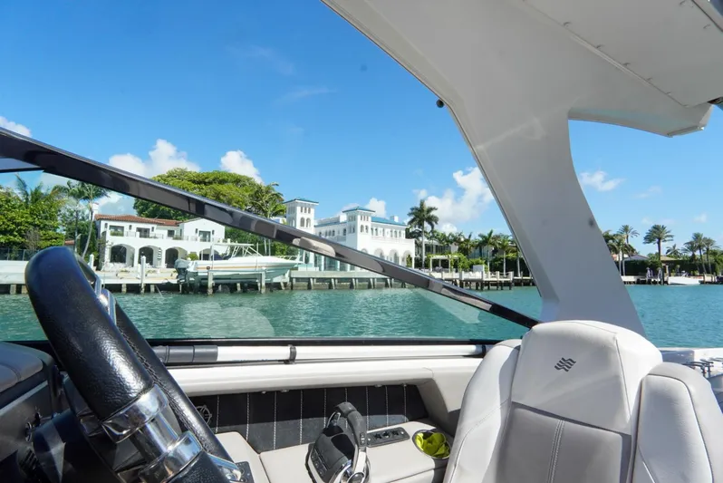  Yacht Photos Pics 2017 Four Winns H350 boat interior with waterfront view and luxury homes.