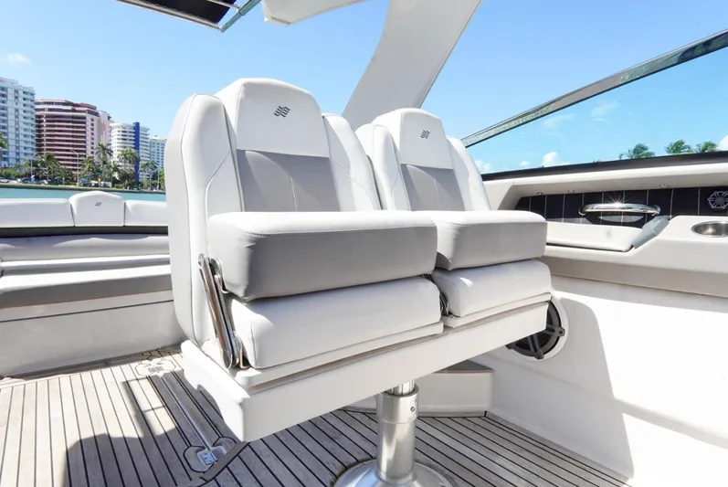  Yacht Photos Pics Luxury seating on 2017 Four Winns H350 boat, featuring sleek design and waterfront view.