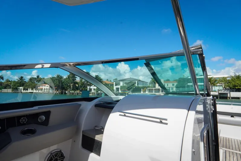  Yacht Photos Pics 2017 Four Winns H350 boat interior with waterfront view and clear blue sky.
