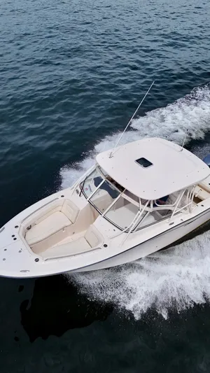 Bay Tripper Yacht Photos Pics 2019 Grady-White Freedom 307 boat cruising on open water.