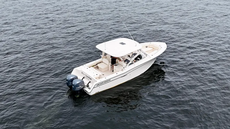 Bay Tripper Yacht Photos Pics 2019 Grady-White Freedom 307 boat cruising on open water.