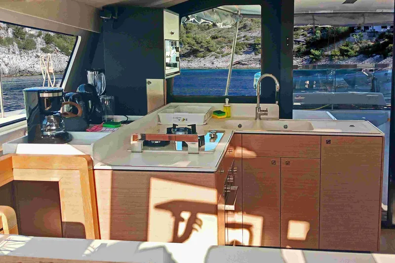 Double Memory Yacht Photos Pics Modern kitchen interior of 2023 Nautitech 44 Open yacht with scenic ocean view.