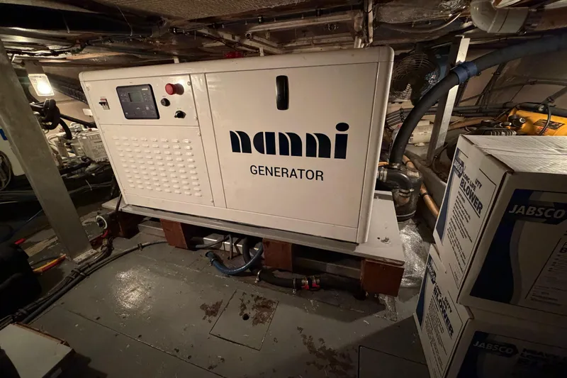  Yacht Photos Pics Engine room of 1991 Hatteras 70 Motor Yacht with Nanni generator.