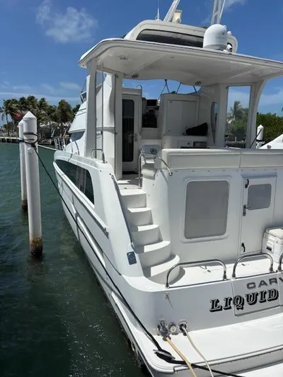  Yacht Photos Pics 2006 Carver 43 Motor Yacht docked, featuring spacious deck and elegant design.