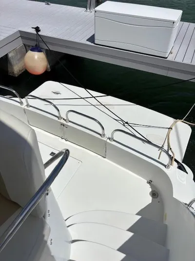  Yacht Photos Pics 2006 Carver 43 Motor Yacht docked, showing deck and railing details.