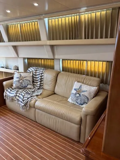  Yacht Photos Pics Luxurious interior of 2006 Carver 43 Motor Yacht with leather sofa and decorative pillows.