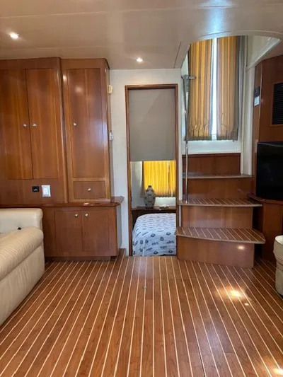  Yacht Photos Pics Interior of 2006 Carver 43 Motor Yacht with wooden flooring and cozy furnishings.