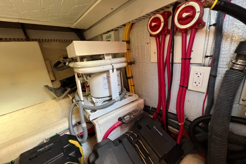 Sachem Yacht Photos Pics Engine room of 2006 Sabre 36 Flybridge Sedan with electrical components and wiring.