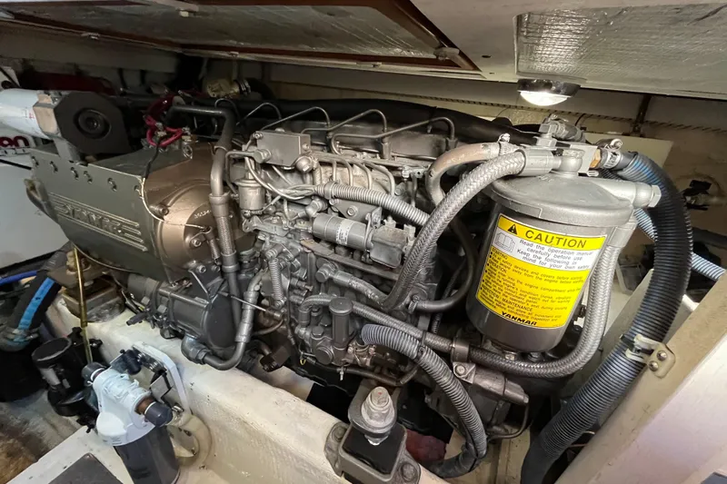 Sachem Yacht Photos Pics Engine compartment of 2006 Sabre 36 Flybridge Sedan, showcasing detailed mechanical components.