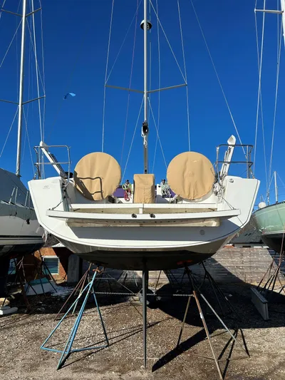 4770jg Yacht Photos Pics 2015 Dufour 410 GL sailboat on stands under clear blue sky.