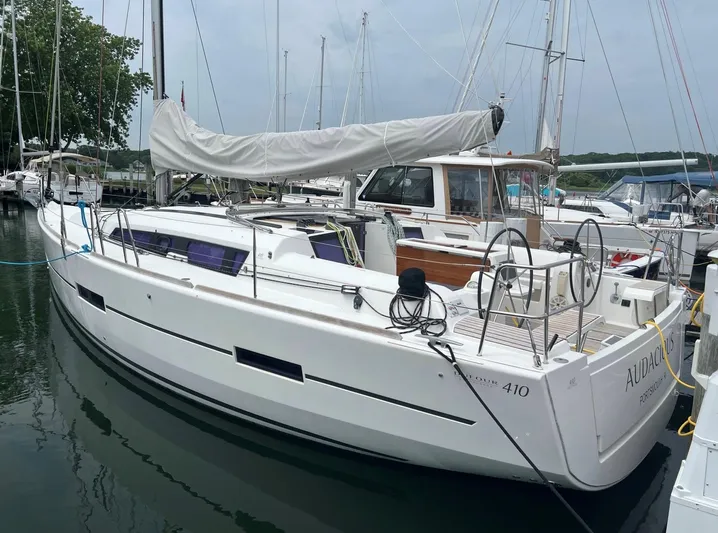 4770jg Yacht Photos Pics 2015 Dufour 410 GL sailboat docked in marina, side view.