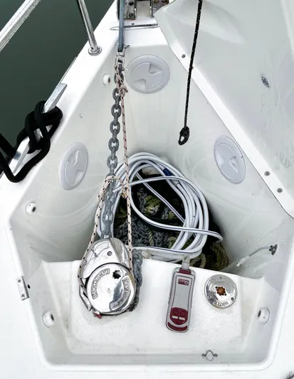 4770jg Yacht Photos Pics Anchor locker of 2015 Dufour 410 GL sailboat with chain and ropes.