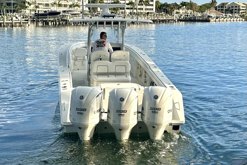  Yacht Photos Pics 2015 Jupiter 38 FS boat with triple Yamaha 300 engines on calm water.