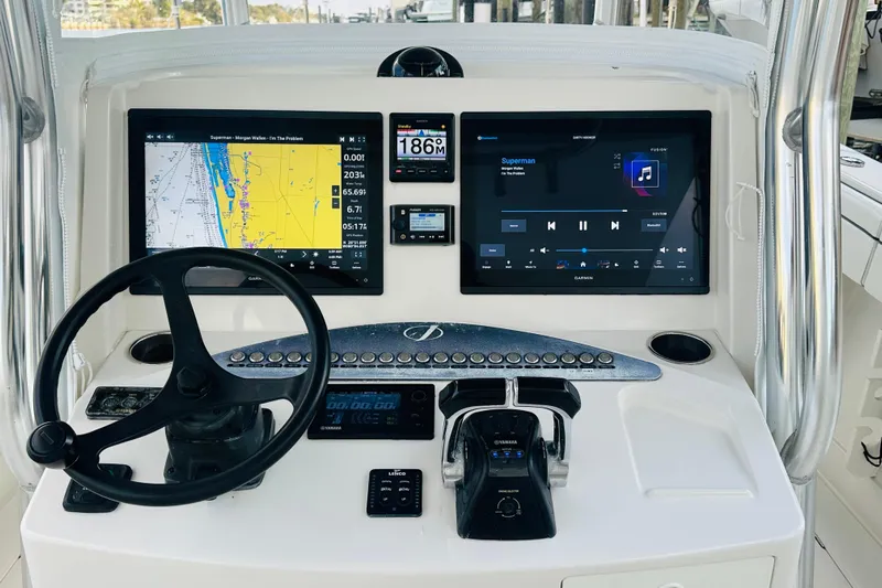  Yacht Photos Pics 2015 Jupiter 38 FS boat dashboard with navigation and control systems.