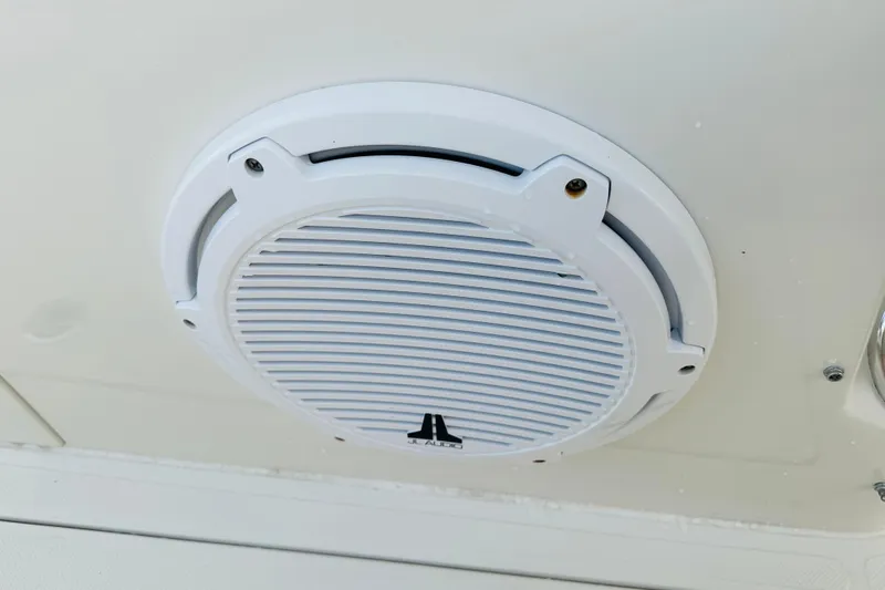  Yacht Photos Pics White speaker on 2015 Jupiter 38 FS boat ceiling, featuring JL Audio branding.