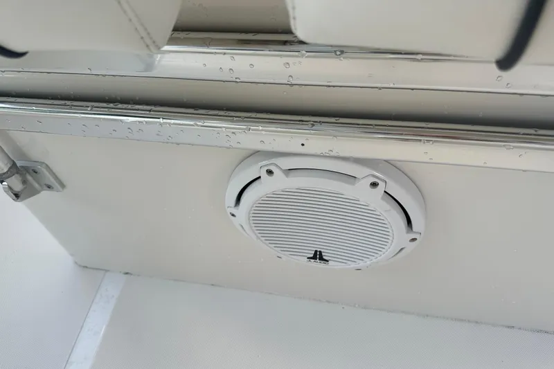  Yacht Photos Pics Speaker on 2015 Jupiter 38 FS boat, with water droplets on surface.