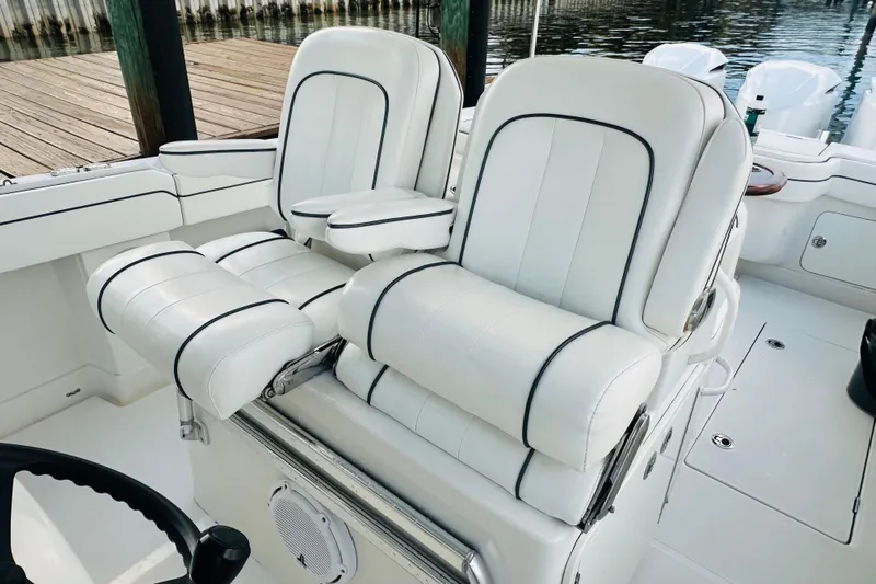  Yacht Photos Pics 2015 Jupiter 38 FS boat with luxurious white seating and sleek design.