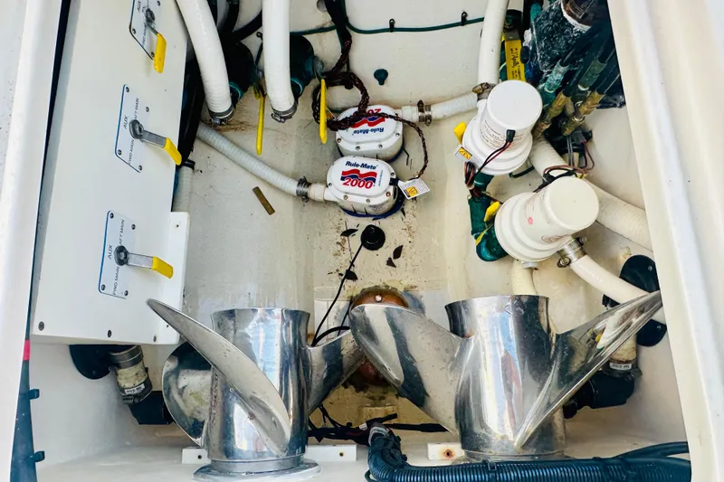  Yacht Photos Pics Engine compartment of 2015 Jupiter 38 FS boat with propellers and wiring.