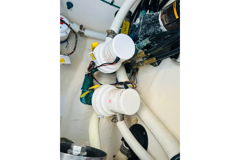 Yacht Photos Pics Engine compartment of 2015 Jupiter 38 FS boat with visible filters and wiring.