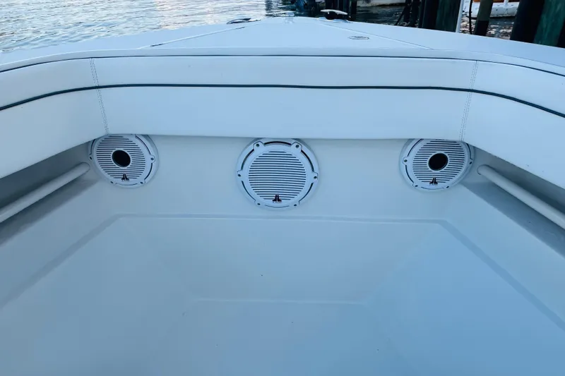  Yacht Photos Pics 2015 Jupiter 38 FS boat interior with speakers, docked by the water.