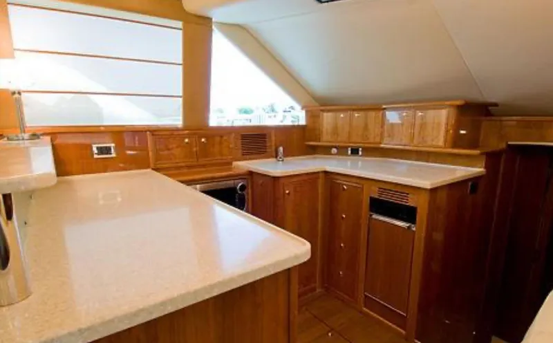 2009 Riviera 47 Yacht Photos Pics Luxurious kitchen interior of 2009 Riviera 47 Enclosed Flybridge Series II yacht.