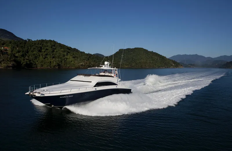 Mare Blu Yacht Photos Pics 2008 Pro Boat Yachts Power Cat 80 cruising on a scenic waterway.