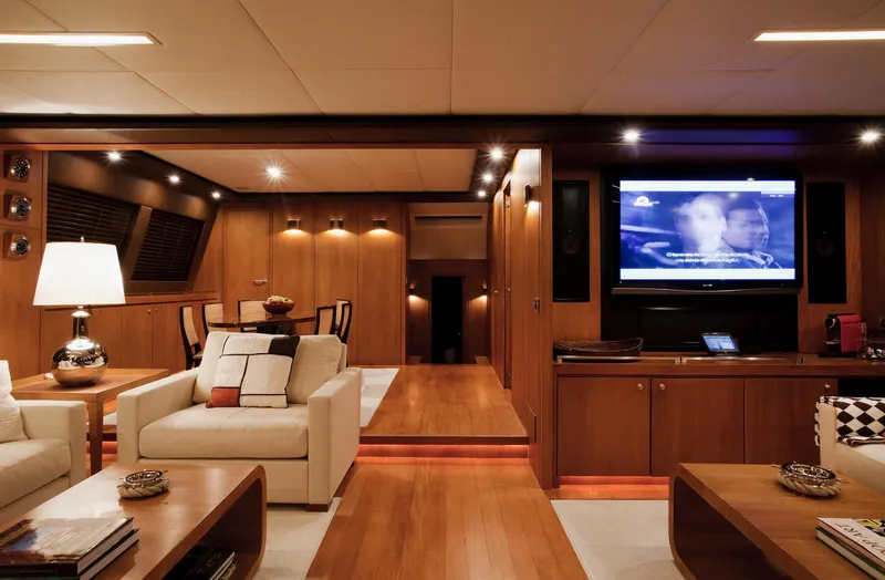 Mare Blu Yacht Photos Pics Luxurious interior of 2008 Pro Boat Yachts Power Cat 80 with modern furnishings and entertainment system.