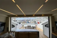 Luxurious interior view of 2015 Pershing 70 yacht overlooking marina.