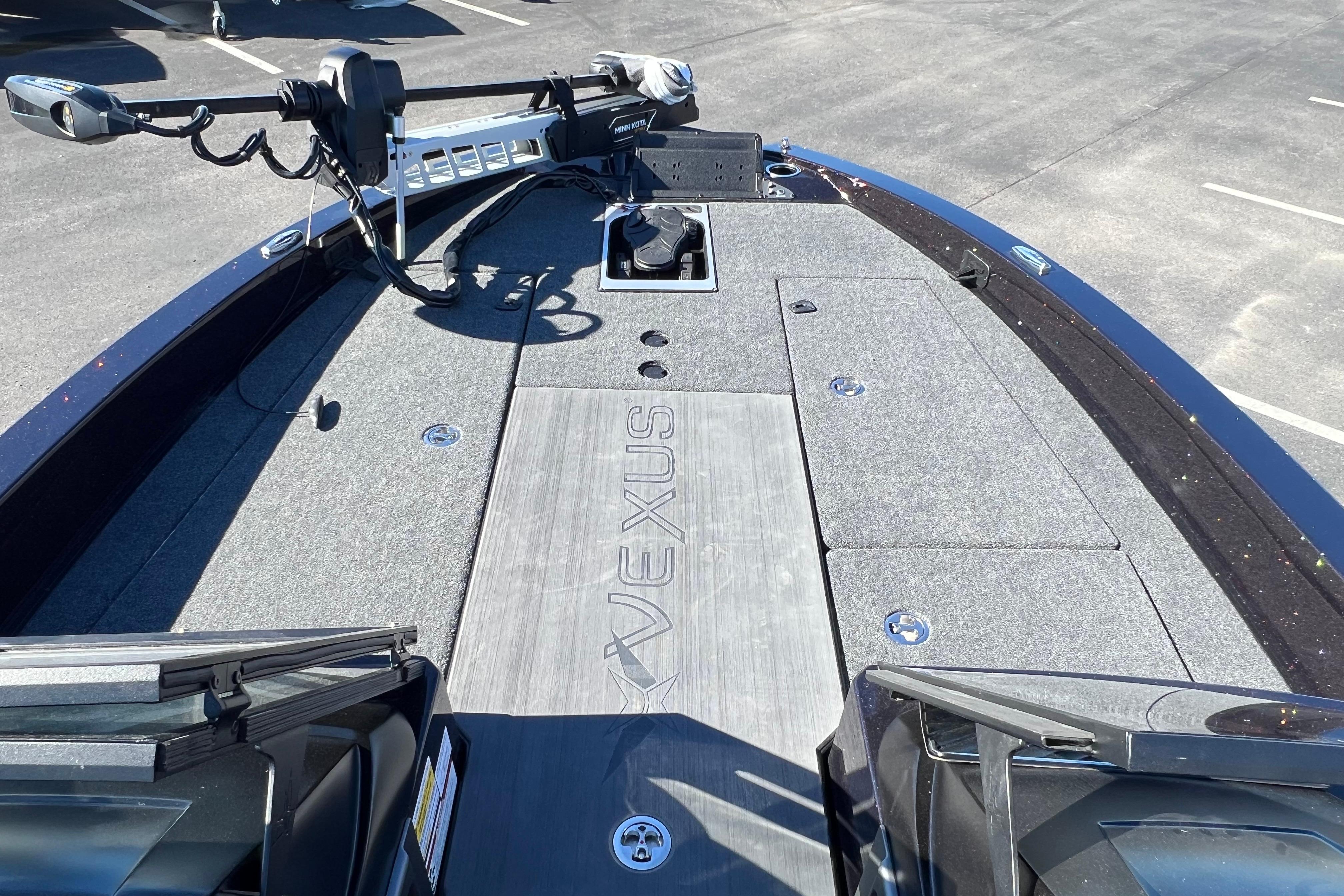 2026 Vexus DVX20S boat deck with trolling motor and storage compartments.
