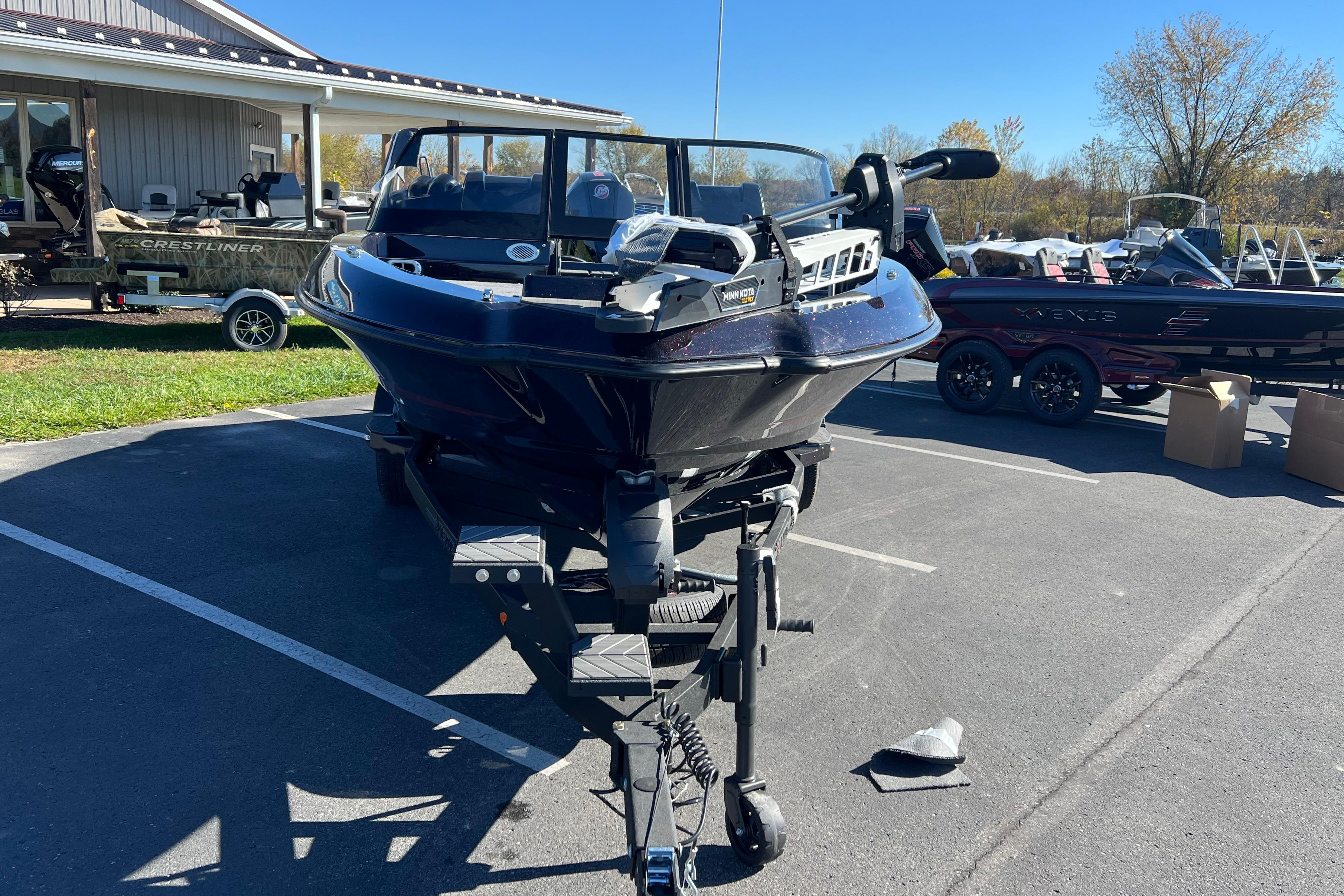 2026 Vexus DVX20S boat on trailer in outdoor parking lot.