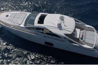 Luxury 2015 Pershing 70 yacht cruising on open sea.