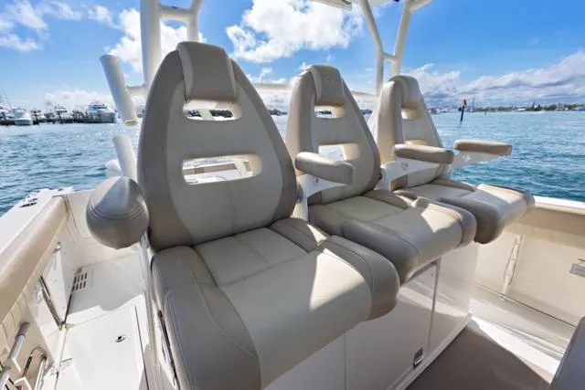 Odd Job Yacht Photos Pics Luxurious seating on 2019 Sailfish 360 CC boat with ocean view.