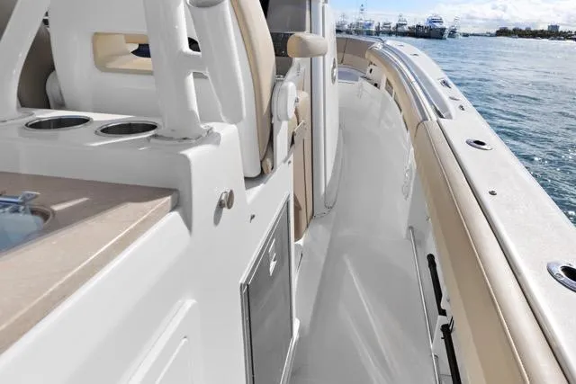 Odd Job Yacht Photos Pics 2019 Sailfish 360 CC boat deck with seating and ocean view.