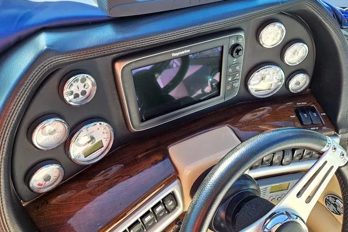  Yacht Photos Pics Dashboard of 2014 Four Winns V375 boat with gauges and navigation system.