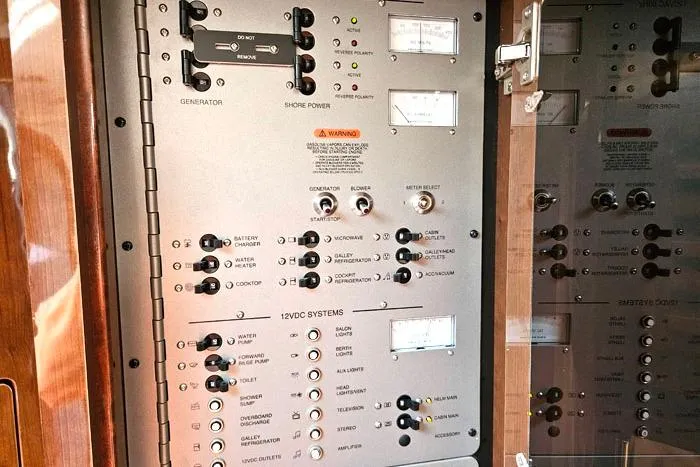  Yacht Photos Pics Electrical control panel on a 2014 Four Winns V375 boat, featuring various switches and gauges.