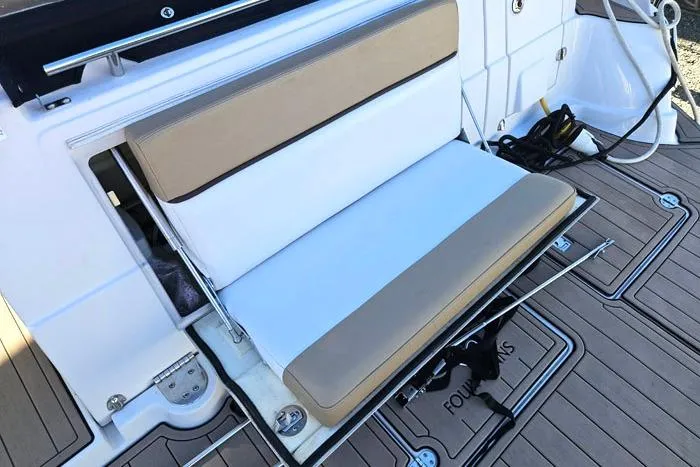  Yacht Photos Pics 2014 Four Winns V375 boat with foldable seating on deck.