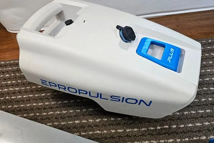  Yacht Photos Pics White ePropulsion Plus motor on striped carpet, 2014 Four Winns V375 model.